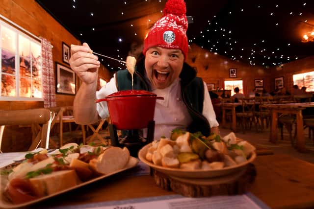 Many restaurants need a Christmas chef. Chef Andrew Pern pictured trying the Fondue in The Winter Hütte at York Christmas Market. Picture by Simon Hulme