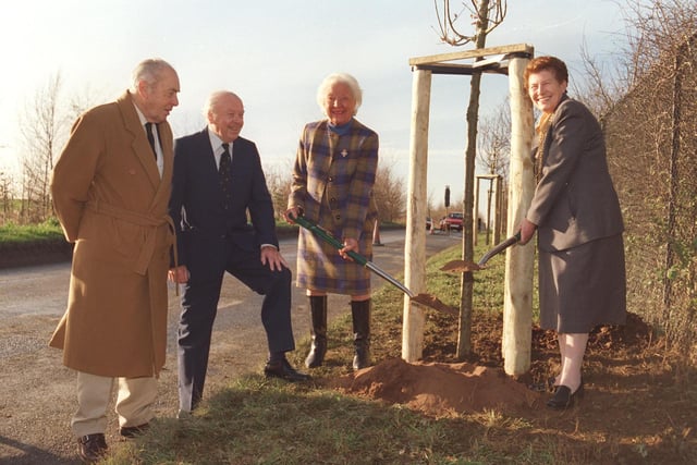 The widow of Sir Douglas Bader,Lady Joan Bader, (left) and the Mayor of Doncaster Counc.Maureen Edgar plant trees in Cadeby Lane,Sprotborough  watched by ex RAF pilots,Squadran Leader Kenneth Lee and Flight Leiutenant Leslie Allen in 2000