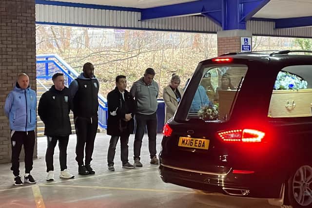 Sheffield Wednesday chairman, Dejphon Chansiri, as well as manager, Darren Moore and coach, Jimmy Shan, pay their respects to Elaine Murphy.