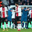 Southampton's Mohammed Salisu and Duje Caleta-Car appear to be arguing with each other at the final whistle during the Premier League match between Southampton FC and Newcastle United at Friends Provident St. Mary's Stadium on November 06, 2022 in Southampton, England. (Photo by Charlie Crowhurst/Getty Images)