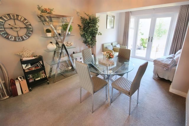 The living/dining area looks stunning. The dining space leads out to that fab garden.