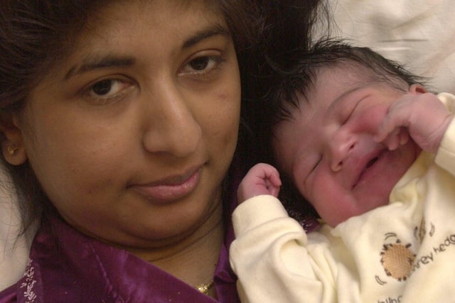 Yasmin Akhtar from Sheffield is seen with her 2002 Christmas Day baby Isa Ditta, born at 6.33am, weight 6lb 10 oz