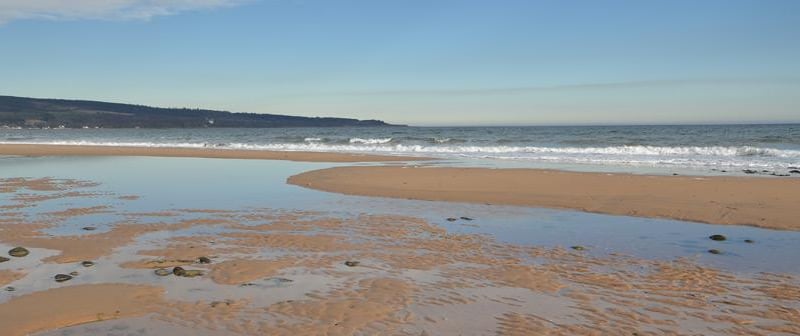 Sitting on Golspie beach, this cottage has a homely sitting room, with places to relax and replenish under the warming embrace of the wood-burning stove. You could even enjoy a romantic meal at the dining table by the window.