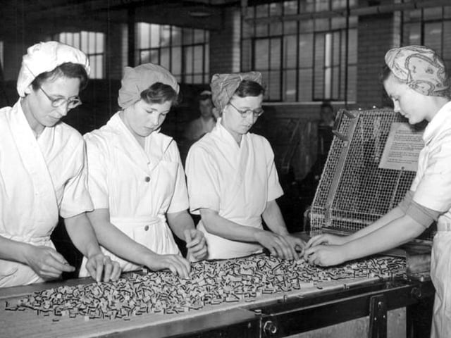Staff are pictured checking Liquorice Allsorts in 1952.