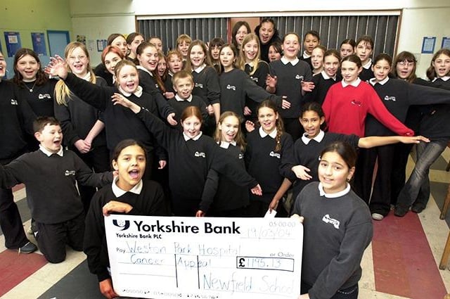 Pupils from Newfield School, Norton Lees with their cheque for £1,195.13 they raised with a danceathon for the Weston Park Cancer Appeal. Holding the cheque are Raquel Palmer (left) and Natasha Iftikhar, on March 19, 2004