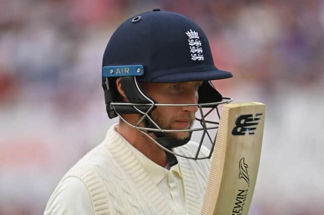 England's captain Joe Root raises his bat after being dismissed against India (PAUL ELLIS/AFP via Getty Images)