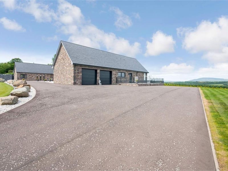 Driveway and double garage.