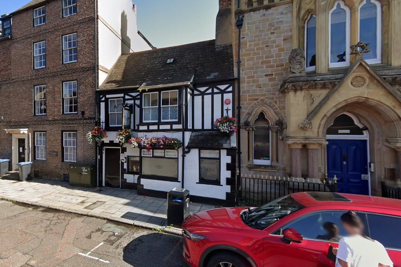 Described as an "Unchanging backstreet pub in pretty 16th-c black and white timbered cottage; tiny chatty front bar with wall benches, corridor to long narrow back lounge."
Pic: Google Images