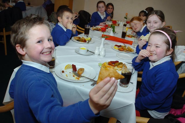 Pupils enjoying the food at Cafe Spice as part of the school's project about India in 2011.