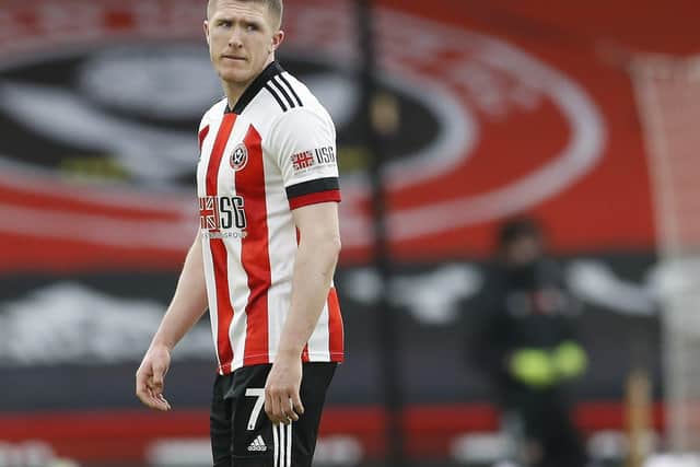 John Lundstram of Sheffield United leaves the pitch at the final whistle during the Premier League match at Bramall Lane, Sheffield. Picture date: 6th March 2021. Picture credit should read: Darren Staples/Sportimage