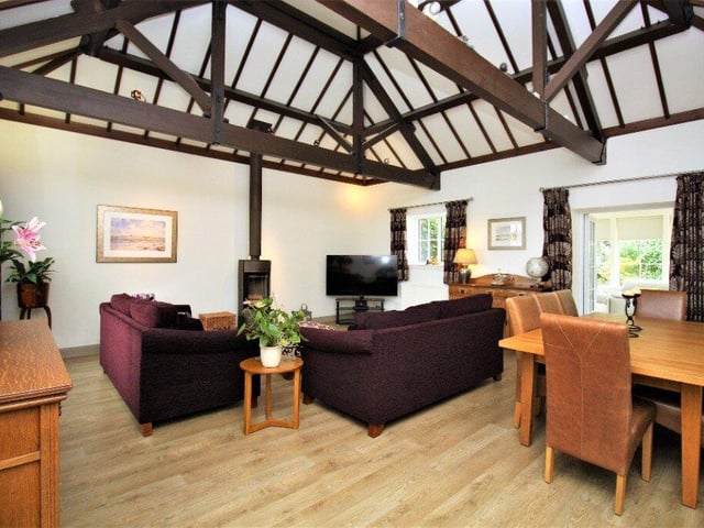 A luxury bright and airy three-bedroom, two bathroom family home in a quiet residential hamlet, just over two miles from the Old Course, with private parking and a secluded south facing garden - £25,000 total stay.