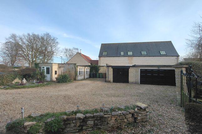 The property also features a triple garage and a one bedroom annexe