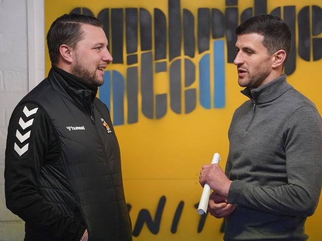 The two coaches Mark Bonner and John Mousinho have a chat. Picture: Jason Brown/ProSportsImages