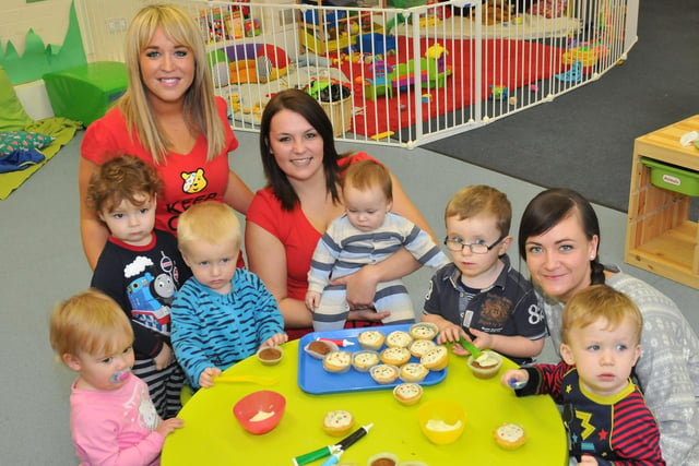Cheeky Monkeys Nursery staff Carly Fields, Becci Wheatley and Robyn Crookston with children Megan Deer, Layden Wyness, Ellis Jones, James Slack, Alfie Beer, and Mason Barnett making cup cakes in aid of Children In Need. Does this bring back memories from eight years ago?