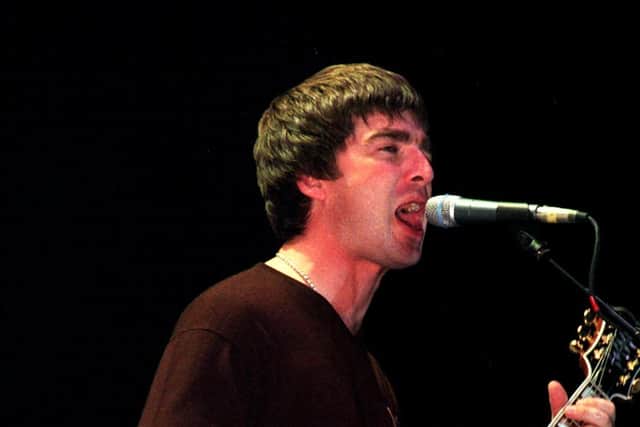 Liam Gallagher has raised hopes of a reconciliation with brother Noel, pictured here playing at Sheffield Arena in 1997, and a possible reunion for the indie legends Oasis. Photo: Dean Atkins
