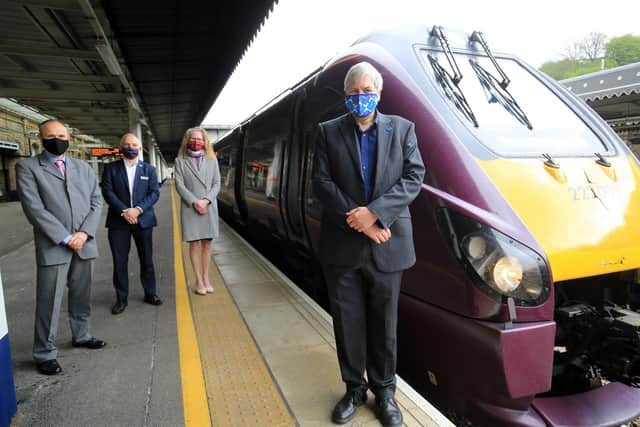 Peter Kennan, right, private sector board member at South Yorkshire Local Enterprise Partnership at the launch of a new EMR train service at Sheffield station.