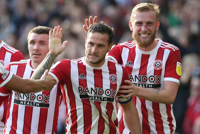 Billy Sharp has signed a new deal at Sheffield United that will keep him at Bramall Lane at least until the summer of 2023