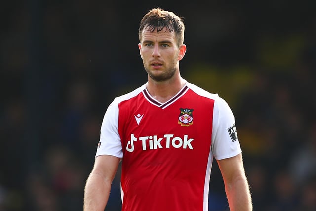 Lennon has been an ever-present for Wrexham this season and has continually grown in prominence. The 26-year-old has kept six clean sheets in the National League this term. (Photo by Jacques Feeney/Getty Images)