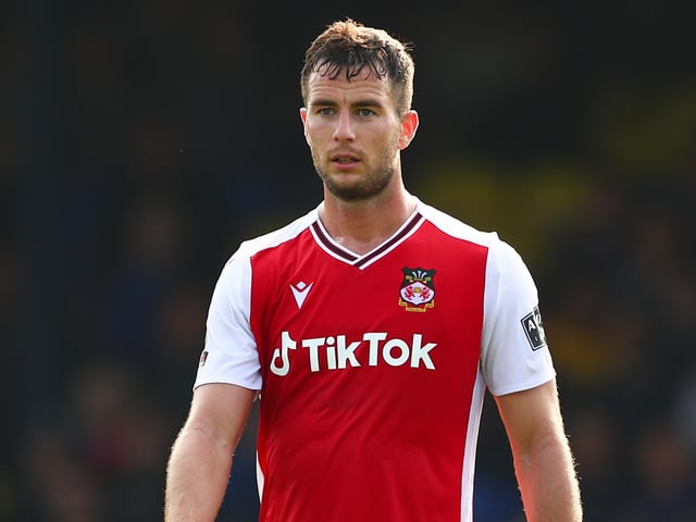 Lennon has been an ever-present for Wrexham this season and has continually grown in prominence. The 26-year-old has kept six clean sheets in the National League this term. (Photo by Jacques Feeney/Getty Images)