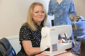 Gina Taylor, 50 who is making her own dresses in lockdown after being furloughed. Picture: Chris Etchells