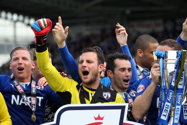 Players celebrate after Chesterfield won the League 2 Championship