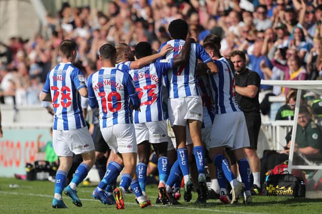 Hartlepool United's Gavan Holohan celebrates with his team mates and the bench during the Sky Bet League 2 match between Hartlepool United and Carlisle United at Victoria Park, Hartlepool on Saturday 28th August 2021. (Credit: Mark Fletcher | MI News)