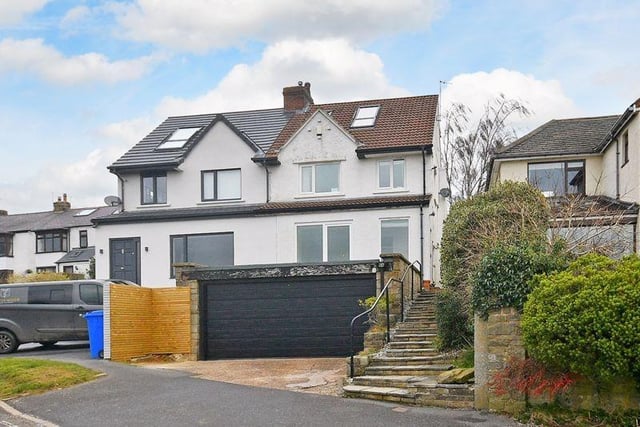 This "fabulous" four-bed house has hit the market for £695,000.