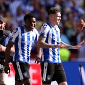 Sheffield Wednesday's Josh Windass celebrates with team-mates after scoring the winning goal in the dying seconds of extra time at Wembley Stadium to beat Barnsley 1-0. Picture: Richard Heathcote/Getty Images