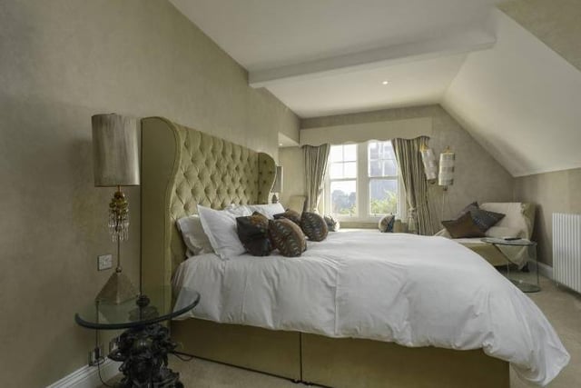 Another of the beautifully-finished bedrooms at the home.