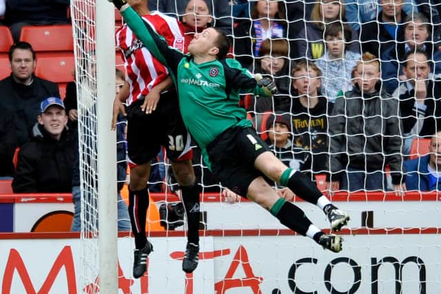 Sheffield United 'keeper Paddy Kenny makes a great late save