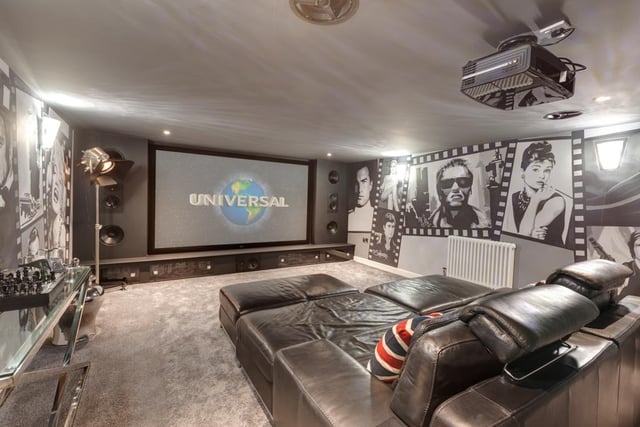 The snug private cinema provides a wonderful hideaway to relax and enjoy some entertainment, and benefits from a built-in surround sound system, an Optoma projector and recessed lighting.