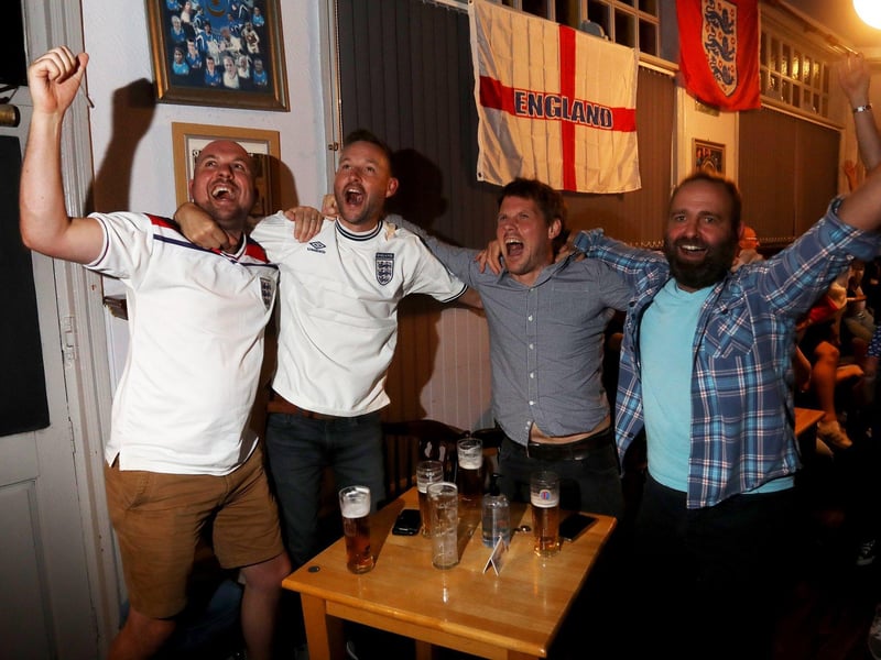 England fans pictured at the Artillery Arms in Portsmouth, UK, watching England play on TV in the Semi-finals at Wembley. Pictured are fans enjoying the night. Picture: Sam Stephenson