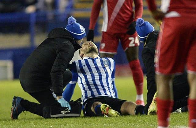 Injury curse strikes as Sheffield Wednesday's new signing Harlee Dean goes off injured.