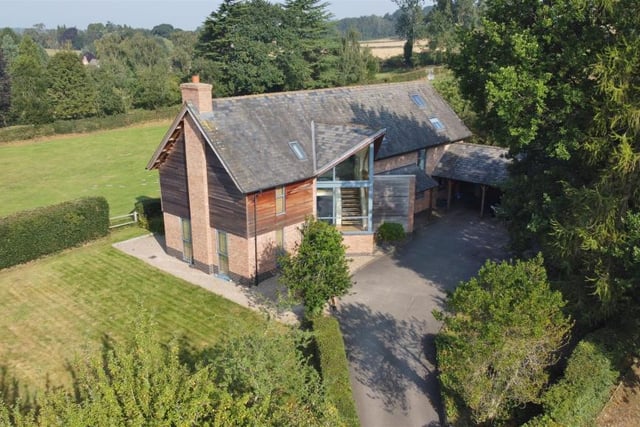 The first of several photos showing drone footage of the Windmill Hill property. As you can see, it is very much an individual home, surrounded by open countryside.