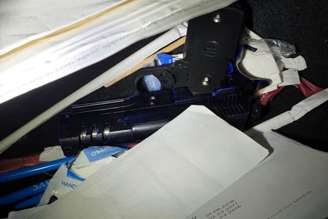 Police recovered the gun after the car was searched.