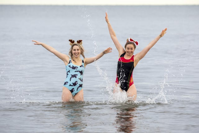 Anna McKay and Muireann O'Regan are among others to take part in the festive tradition of swimming off Edinburgh's coast on Christmas day.