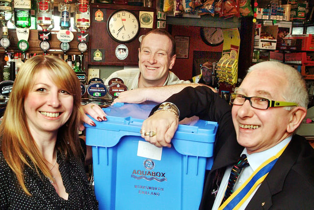 08-0084-2.

Landlord and landlady of the Rose and Crown, Stoneyford Road, Sutton,Steve and Nikki Smith, hand over an aquabox to Kirkby Rotary Club President Bill Wilson at their Sutton pub in 2008
