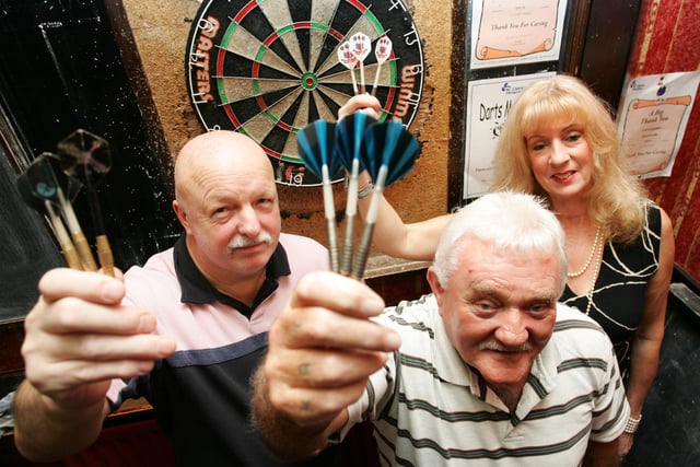 A darts marathon for St Clare's Hospice in 2006 with Stan Dyson, Brian Peacock and Jen English in the picture.