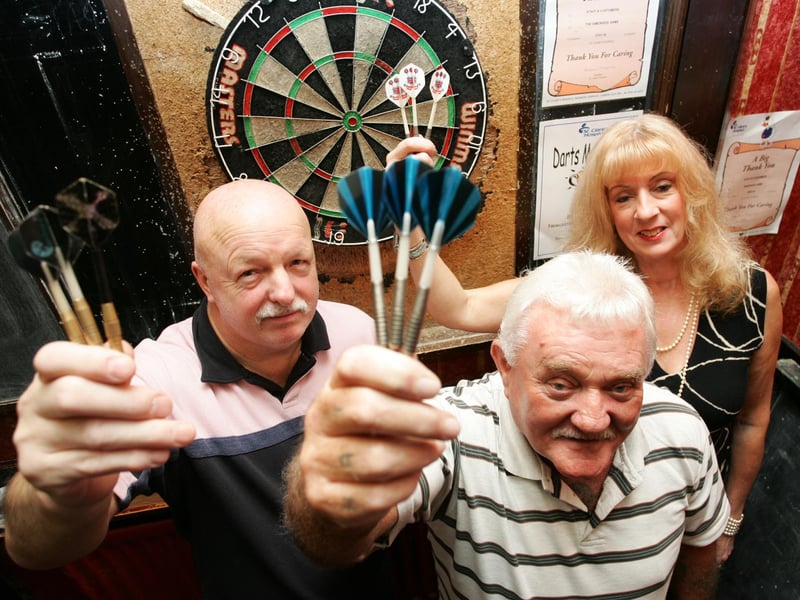 A darts marathon for St Clare's Hospice in 2006 with Stan Dyson, Brian Peacock and Jen English in the picture.