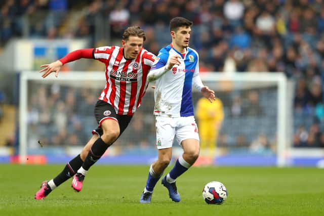 Blackburn Rovers' John Buckley (right) and Sheffield United's Sander Berge battle for the ball during the Sky Bet Championship match at Ewood Park: Tim Markland/PA Wire.