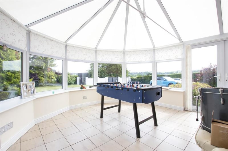 The property boasts a large conservatory to the side.