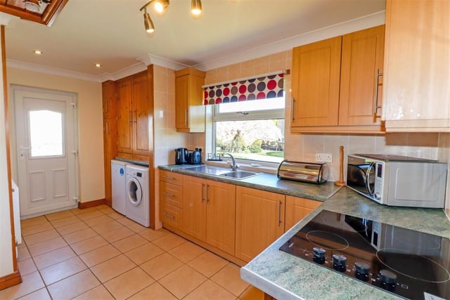 All the kitchen appliances are close at hand in this single storey property.