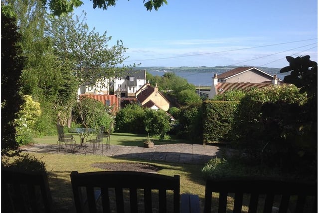 Rear garden in summer with view over River Forth.