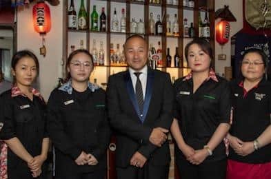 New owner Sai Li, centre, plans to hire staff and launch an all-you-can-eat sushi menu at Wasabi Sabi in a bid to boost its popularity during the week.