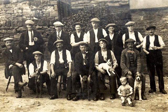 Tap room customers at the Angel Inn in Main Street, Grenoside, taken in the mid 1920's. The licensee at that time is standing in the middle of the back row.