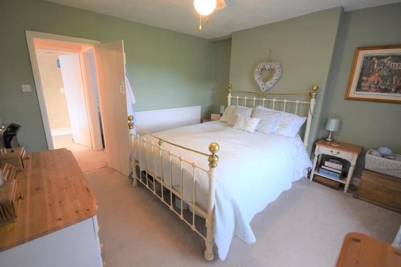 Master bedroom - A rear facing double room has the beautiful views of the rear paddock, and is complemented by modern decoration, radiator, socket point and a very useful built in wardrobe.
