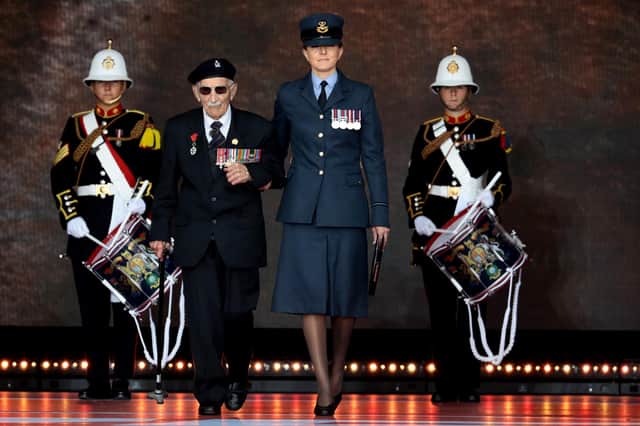 Veteran John Jenkins MBE takes to the stage during the D-Day Commemorations. Picture: Dan Kitwood/Getty Images