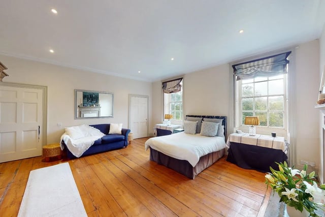 The master bedroom is the largest in the house by a fair margin. It does not have an en-suite per se, but does share another landing with a "room" not "bedroom" which leads to a bathroom.