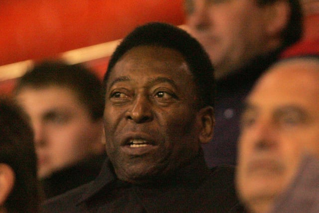 Pele in the stand, with then-Blades boss Bryan Robson in the background.
