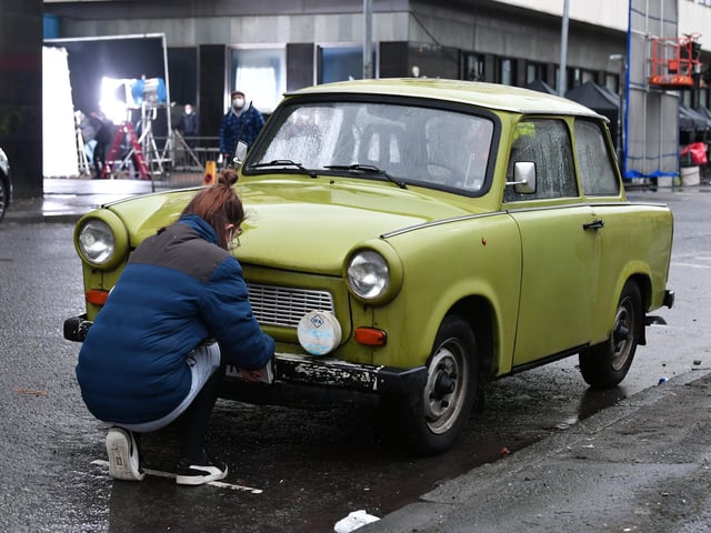 Period cars are brought into the city